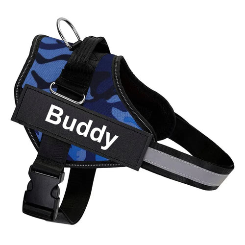 Blue camouflage dog harness with personalized name Buddy and reflective safety strips.